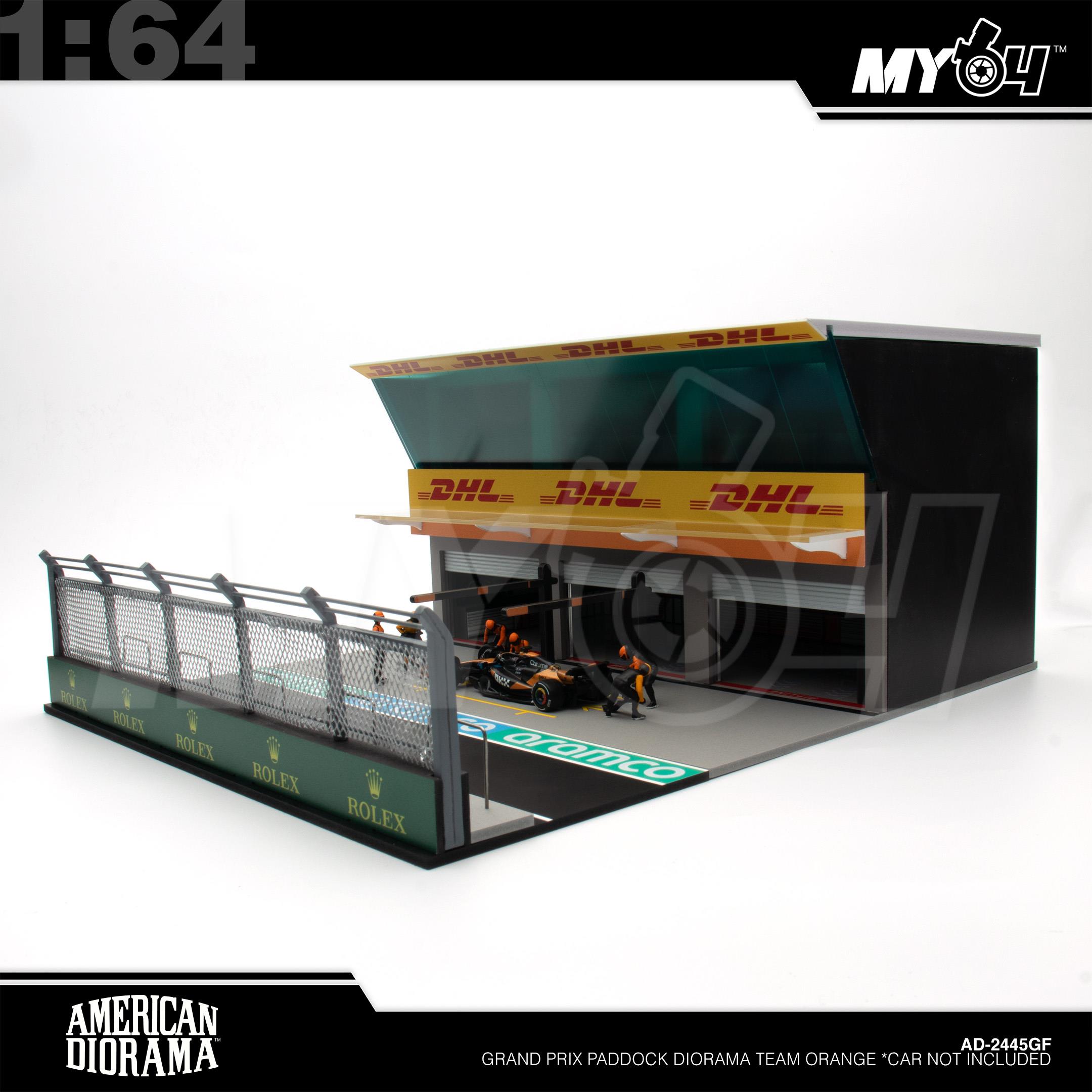 1:64 AMERICAN DIORAMA Grand Prix Paddock Diorama Team Orange *Car not Included